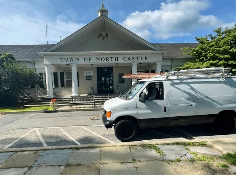 Bedford Power Washing commercial cleaning team at work in Bedford business district