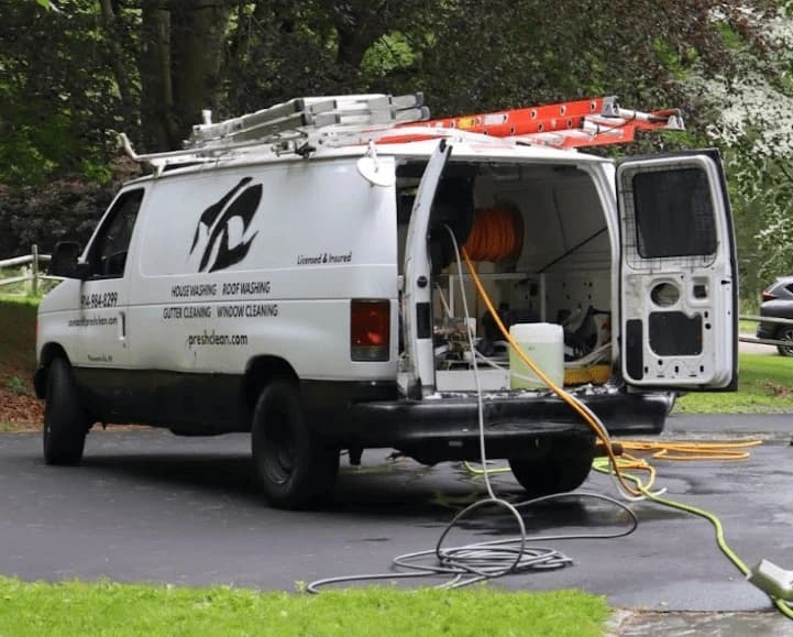 Bedford Power Washing professionals cleaning commercial fleet in Bedford